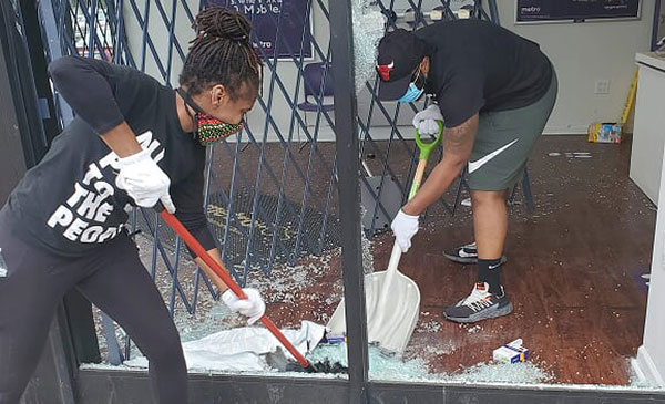 Earth's Remedies helping to clean up a business after riots and looting