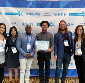 Net Impact members with their award as Net Impact 2019 Graduate Chapter of the Year Finalist 