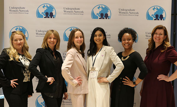 Undergraduate Women's Network executive leaders with conference speakers