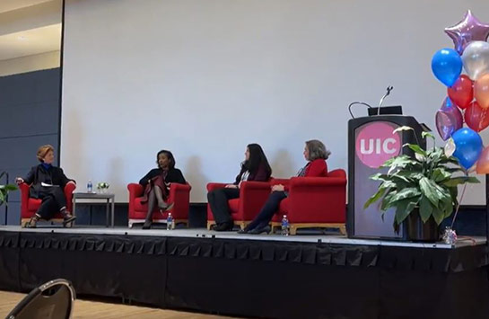 Raven Temple, Karina Gandhi, and Jazmin Santillan speaking to Lecturer Anna Lloyd during the 2023 Women in Business Conference panel