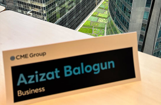 The CME Group nametag of Azizat Balogun, a senior finance major, international business minor, and pre-law student
