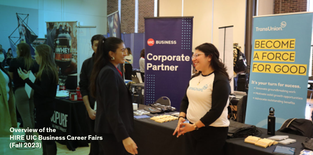 UIC students and employers speaking to each other during a career fair
